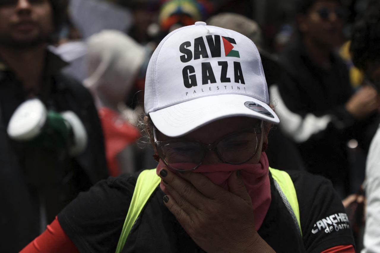 A demonstrator wearing a cap reading "Save Gaza" takes part in a protest against the government of Colombian President Abelardo de la Espriella in Bogota on Oct. 14, 2026. (AFP Photo)