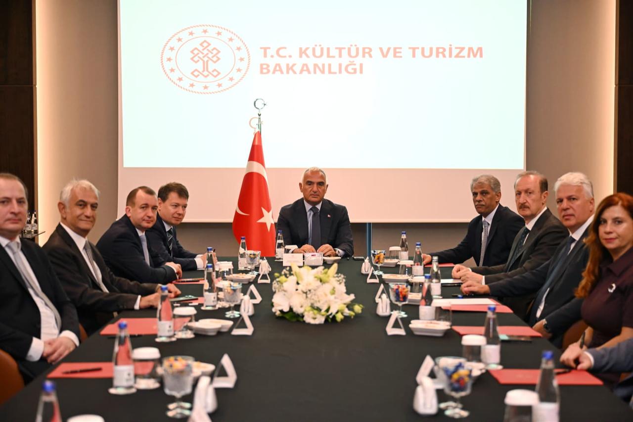 Türkiye's Culture and Tourism Minister Mehmet Nuri Ersoy meets with Russian officials in Antalya to discuss increasing flights and strengthening air transportation cooperation between the two countries. (Photo via Türkiye's Ministry of Culture and Tourism)