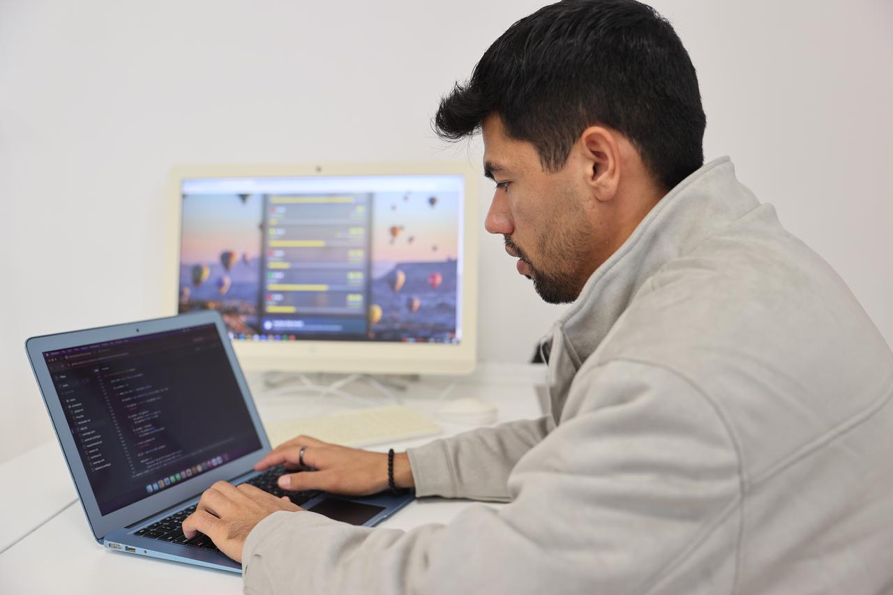 University student Aziz Ullah Meherzad works on an AI-powered application designed to predict hot air balloon flights in Cappadocia, Nevsehir, Türkiye, October 16, 2026. (AA Photo)