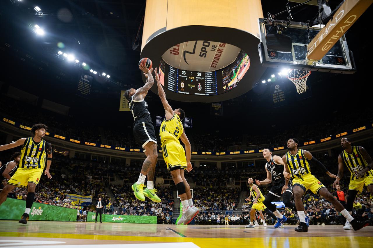 Wade Baldwin IV (2) of Fenerbahce in action against Carlik Jones (1) of Partizan during EuroLeague basketball match between Fenerbahce and Partizan in Istanbul, Türkiye on October 15, 2026. (AA Photo)