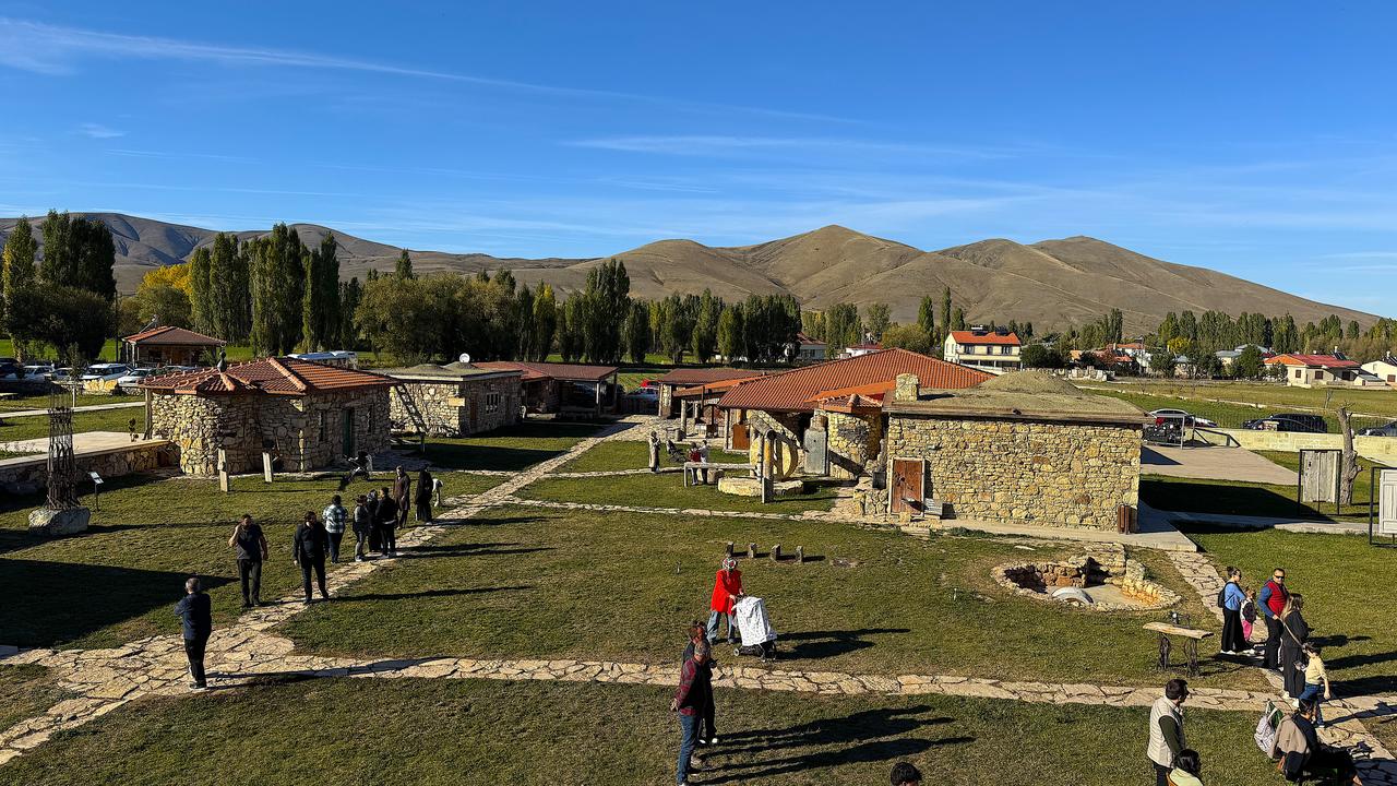 Visitors walk among traditional stone buildings at the Kenan Yavuz Ethnography Museum in Bayburt, Türkiye, which has received five major awards over the past five years, October 16, 2026. (AA Photo)