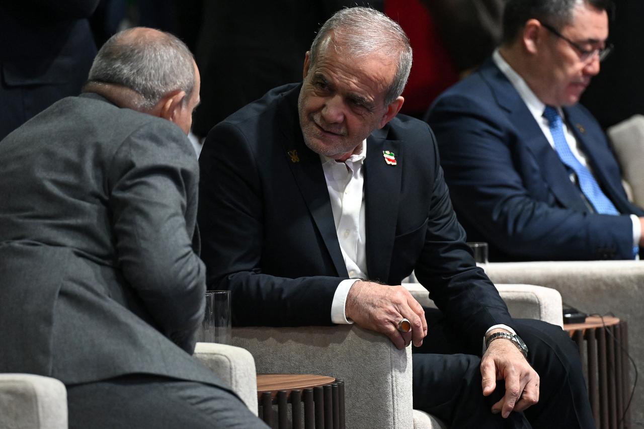 Armenian Prime Minister Nikol Pashinyan and Iranian President Masoud Pezeshkian interact during the leaders' summit of the 17th meeting of the Conference of the Parties (COP 17) to the Convention on Biological Diversity (CBD), in the Armenian capital of Yerevan on October 16, 2026. (AFP Photo)