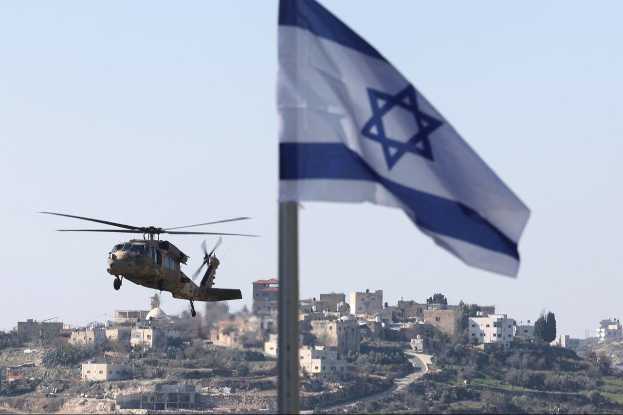 An Israeli military helicopter transports Defence Minister Israel Katz on January 7, 2025. (AFP Photo)