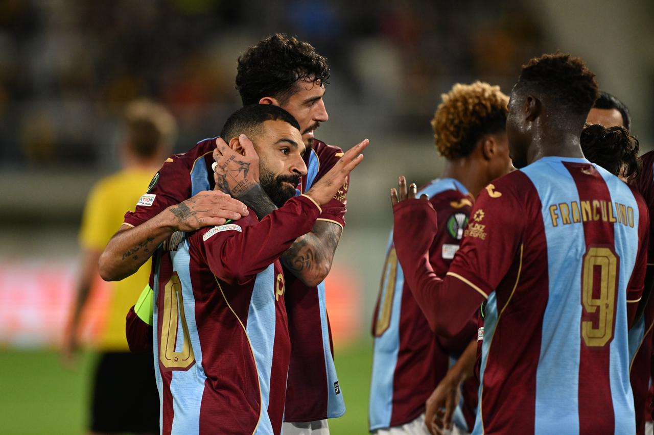 Mohamed Salah (10) of Trabzonspor celebrates with his team mates after a goal during the UEFA Conference League Week 1 match between KuPS Kuopio and Trabzonspor at Tammelan Stadium, on October 15, 2026 in Tampere, Finland. (AA Photo)
