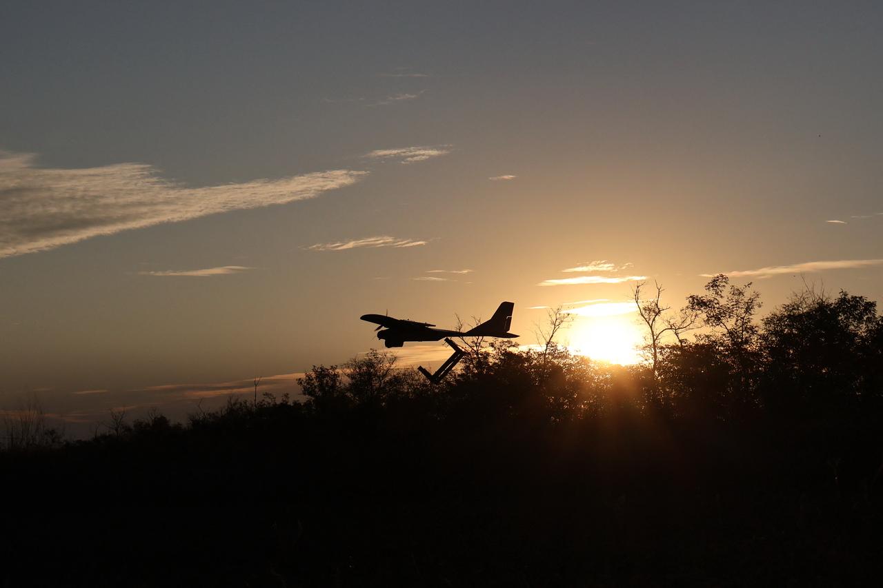 This handout photograph taken and released by the Press Service of the 65th Separate Mechanised Brigade on 7 October 2026, shows a middle strike DARTS drone launched by a Ukrainian serviceman in Zaporizhzhia region, amid the Russian invasion of Ukraine. (Photo by Andriy Andriyenko / Press service of the 65th Separate Mechanised Brigade / AFP)