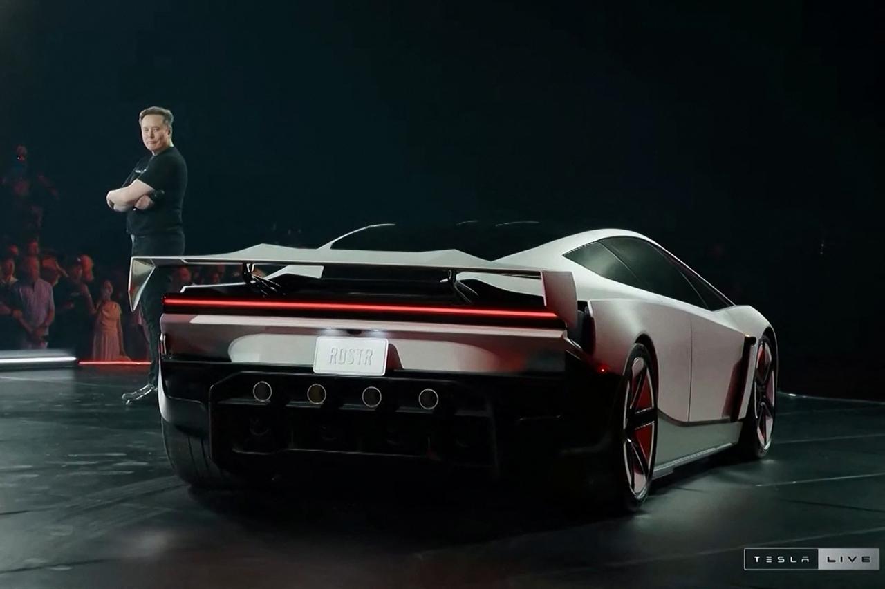 A grab taken on October 16, 2026 from a live feed released by Tesla shows Tech billionaire Elon Musk unveiling on October 15 the next-generation Roadster electric car in McGregor, Texas, United States. (Photo by Tesla)