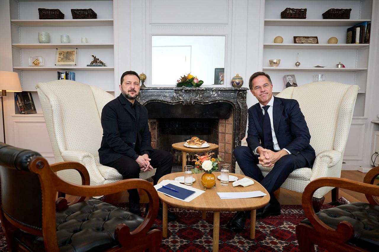 This handout photograph taken and released by the Ukrainian Presidential Press Service on October 15, 2026, shows Ukraine's President Volodymyr Zelensky (L) and NATO Secretary General Mark Rutte (R) posing during their meeting on the sidelines of an EU summit in Brussels. EU leaders head on October 15, 2026. (Photo by Handout / UKRAINIAN PRESIDENTIAL PRESS SERVICE / AFP)