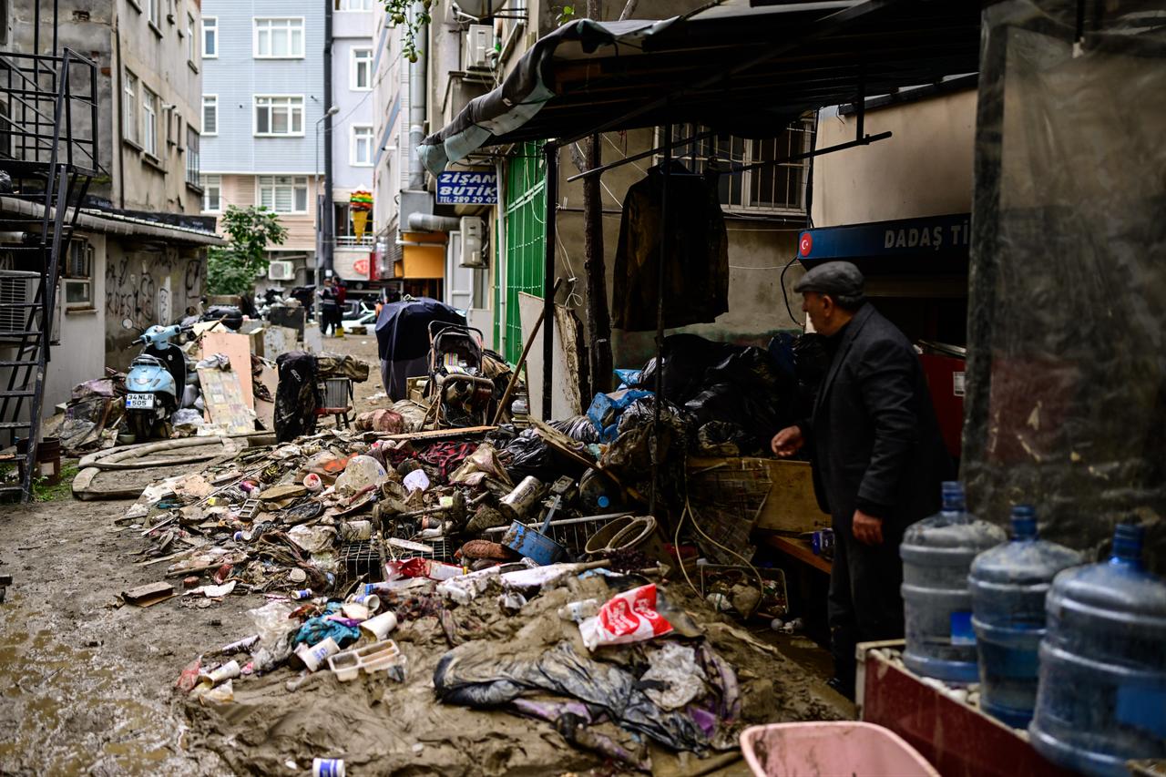 Municipal teams and emergency crews and people continue heavy cleanup and water evacuation operations in the Ayazaga neighborhood of the Sariyer district in Istanbul, Türkiye, on October 16, 2026. (AA Photo)