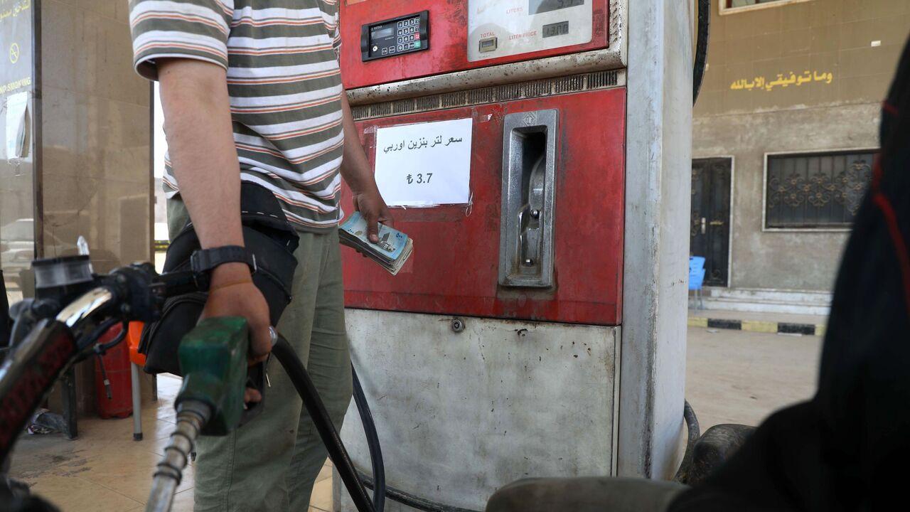 Gasoline prices are displayed in Turkish lira at a gas station in the town of Sarmada in Syria's northwestern Idlib province, on June 15, 2020. (AFP Photo)