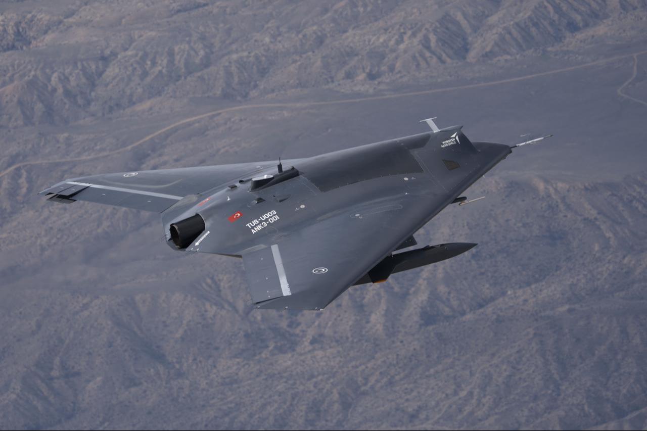 Turkish Aerospace Industries (TAI)'s Anka-3 unmanned combat aircraft carrying two Super Simsek Tactical UAV System at an unspecified time and location. (Photo via TAI)