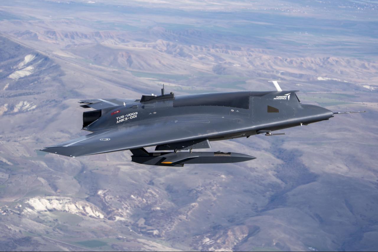 Turkish Aerospace Industries (TAI)'s Anka-3 unmanned combat aircraft carrying two Super Simsek Tactical UAV System at an unspecified time and location. (Photo via TAI)