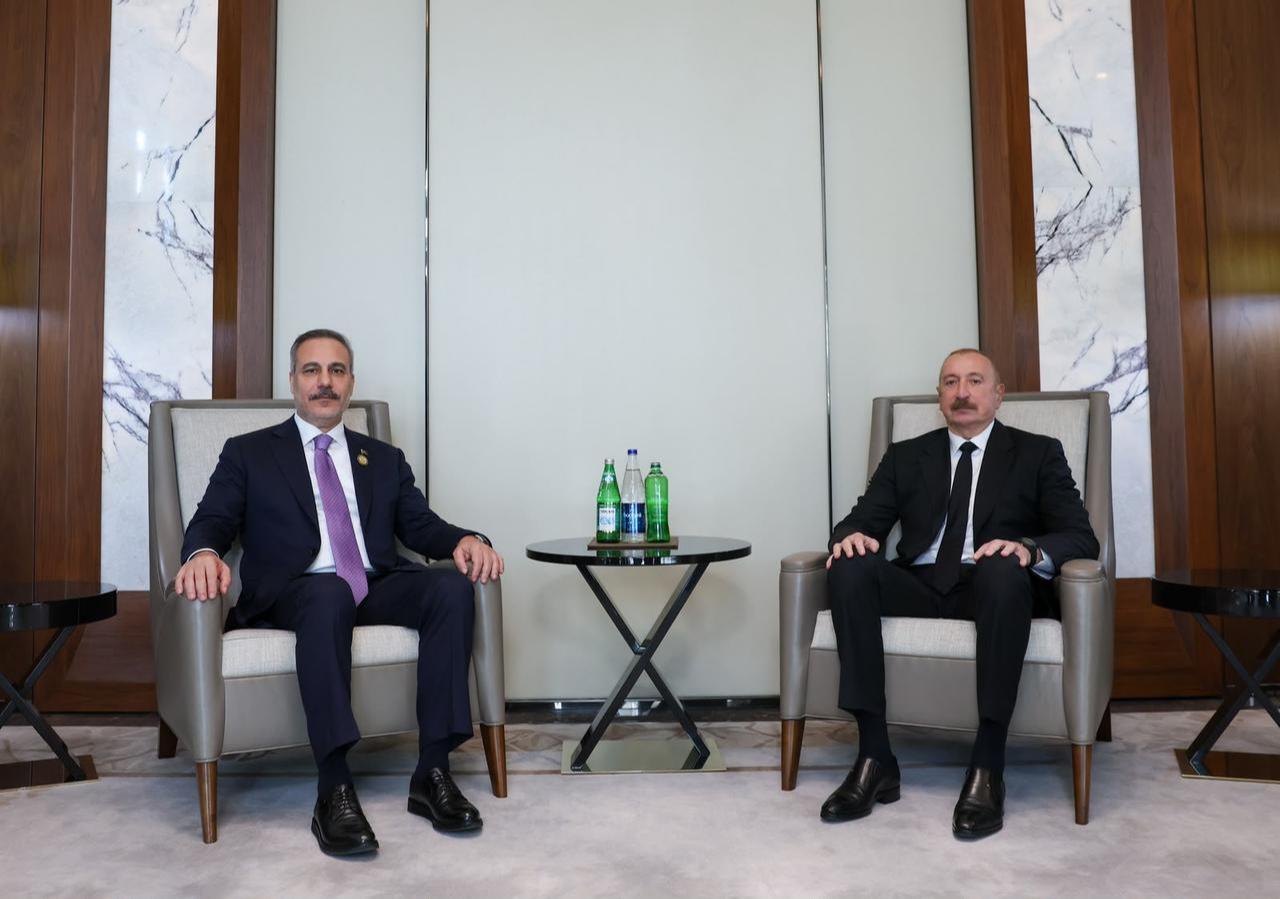 Azerbaijani President Ilham Aliyev meets with Turkish Foreign Minister Hakan Fidan (L) on the sidelines of the 7th Summit of the Conference on Interaction and Confidence Building Measures in Asia (CICA) in Baku, Azerbaijan, on October 15, 2026. (Turkish Ministry of Foreign Affairs / Handout)