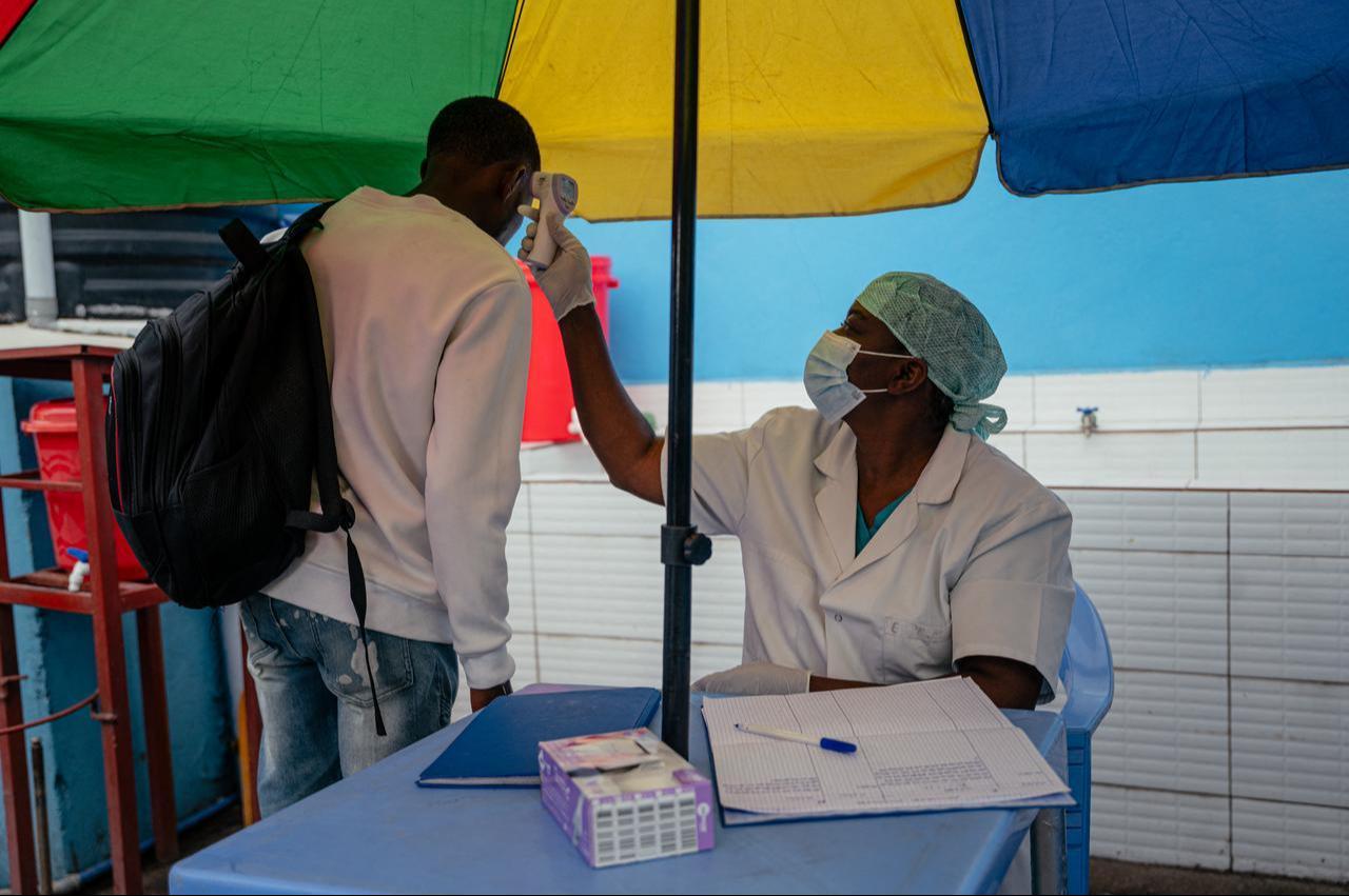 A visitor at the CBCA Virunga hospital has his temperature checked at a screening checkpoint set up at the hospital entrance as part of Ebola prevention measures in Goma, May 21, 2026. (AFP Photo)