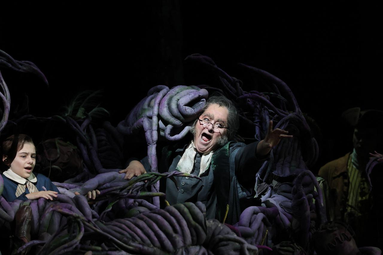 Performers appear among the elaborate tendril-like set pieces during a dress rehearsal of Lincoln in the Bardo at the Metropolitan Opera in New York, October 2026. (AFP Photo)