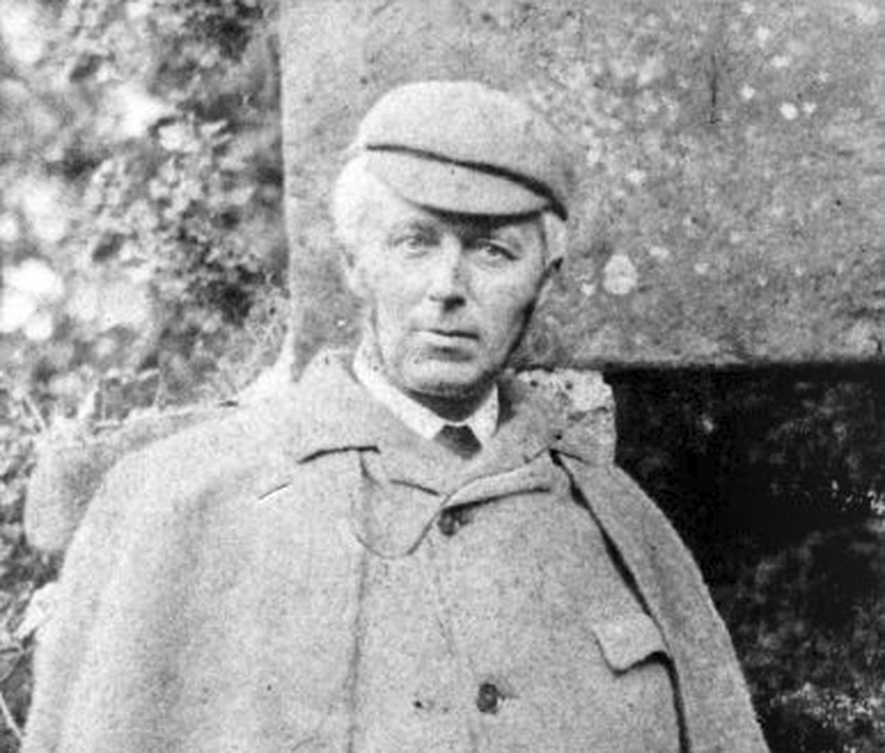 Scottish surgeon Dr. Joseph Bell, an inspiration for the fictional detective Sherlock Holmes, poses outdoors wearing a coat and cap. (Archive Photo)