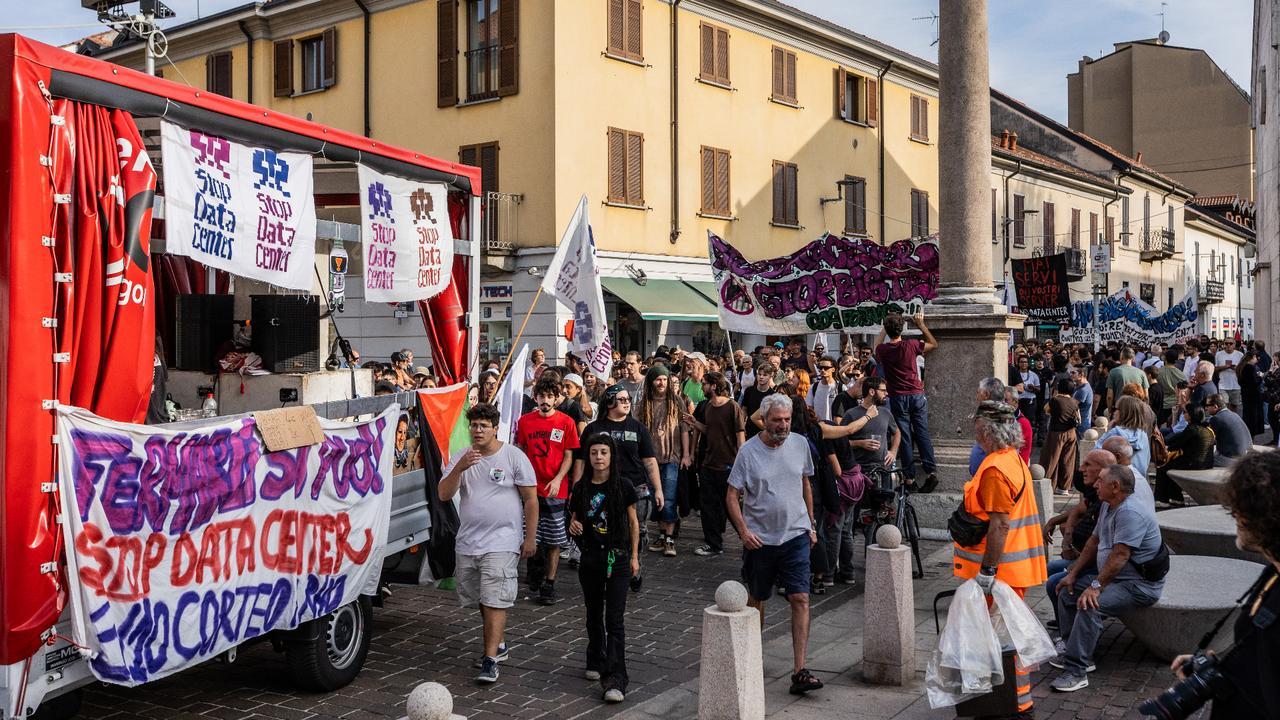 Protesters march against the construction of a new data center in Milan, Italy, on Oct. 3, 2026. (AFP Photo)