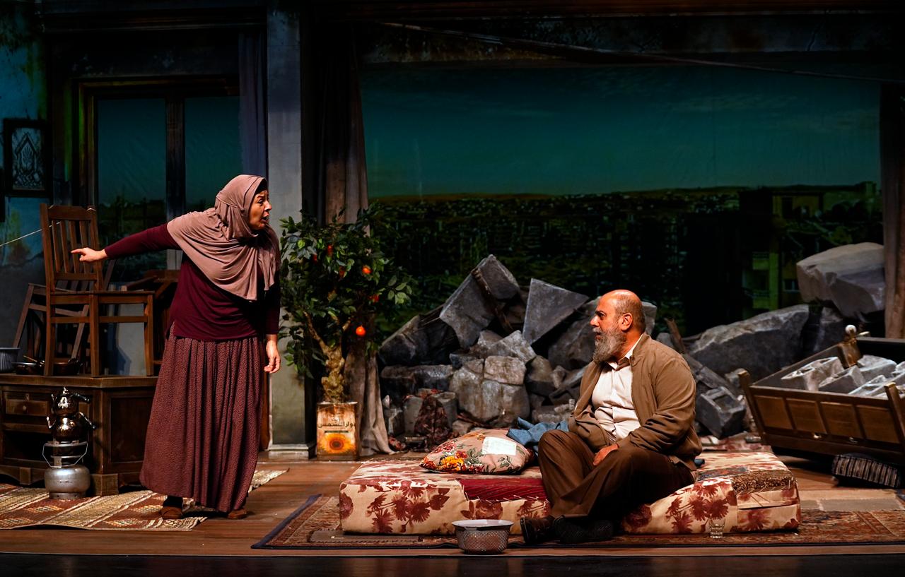 Actors perform a scene depicting life amid destruction in Gaza during a theatrical production by Istanbul State Theatre in Istanbul, Türkiye, Oct. 16, 2026. (AA Photo)