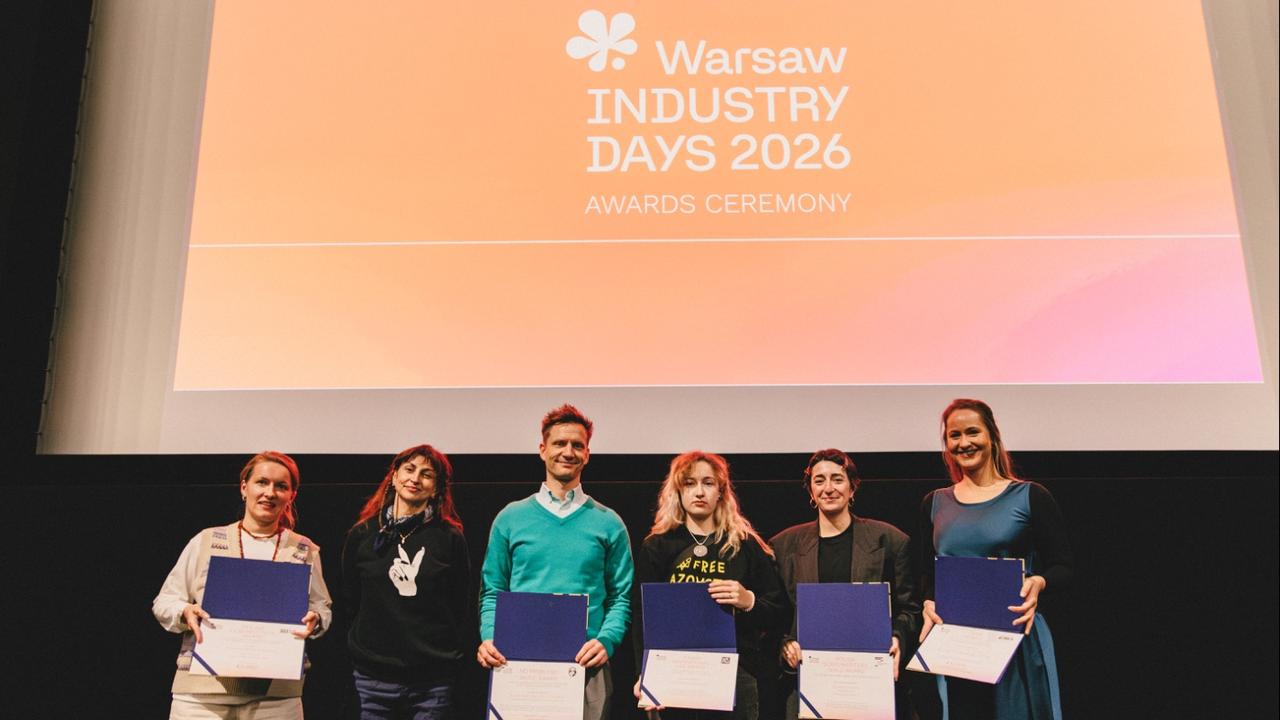 Award recipients pose with their certificates during the Warsaw Industry Days 2026 awards ceremony in Warsaw, Poland, October 2026. (Photo courtesy of Warsaw International Film Festival)