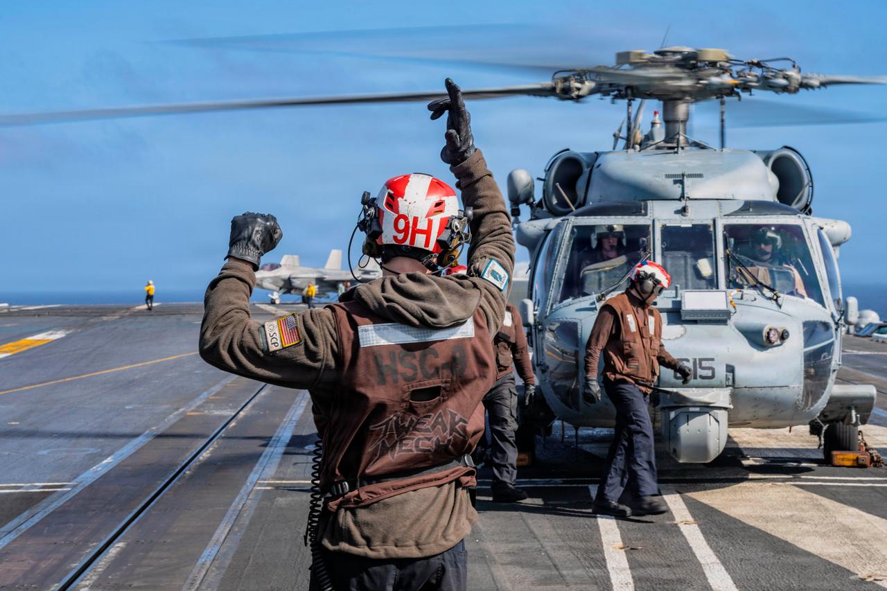 Third US aircraft carrier heads for Mideast as Trump keeps Iran strikes on table Image