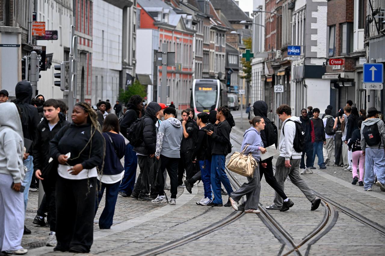 High school students take part in a street in a spontaneous protest against education reforms by the Wallonia-Brussels Federation government and a rise in student fees in Liege, October 1, 2026. (AFP Photo)