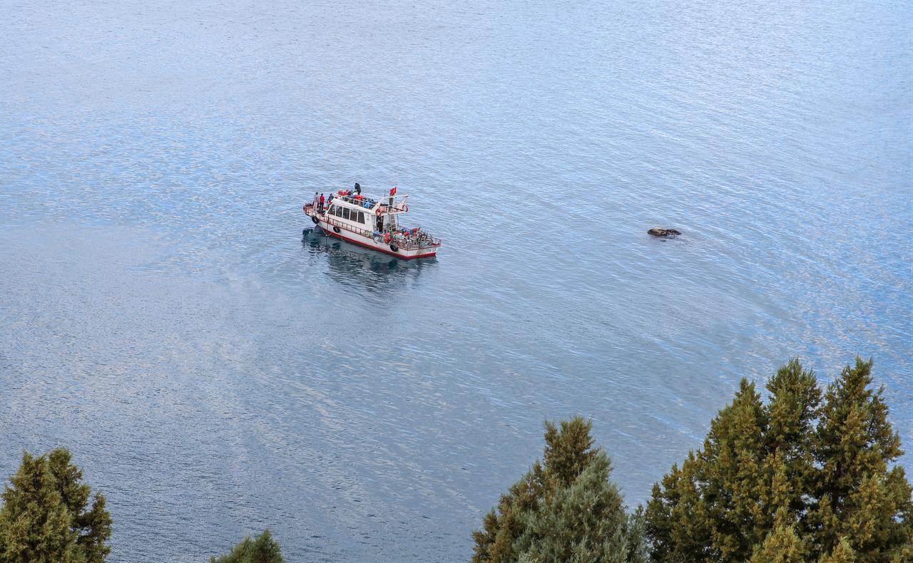 A research boat carries scientists across Lake Van in eastern Türkiye during fieldwork to collect microbialite samples for an international study into their formation. (AA Photo)
