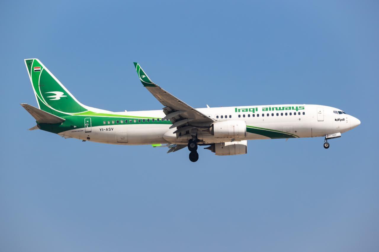 Iraqi Airways Boeing 737-800 YI-ASV lands at Dubai International Airport in Dubai, United Arab Emirates, on Nov. 21, 2025. (Adobe Stock Photo)
