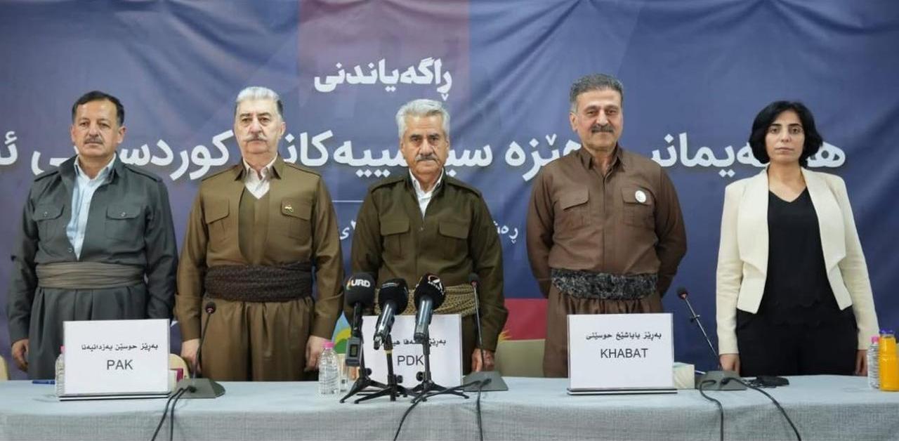 This image depicts a meeting of Kurdish political forces in Iran, including representatives from parties such as PAK, PDKI, and PJAK. (Photo via X)