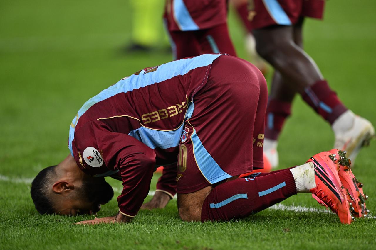 Trabzonspor's Mohamed Salah celebrates after score a goal during the Turkish Super Lig Week 8 football match between Trabzonspor and Besiktas at Papara Park in Trabzon, Türkiye, on October 19, 2026. ( Hakan Burak Altunöz - Anadolu Agency )