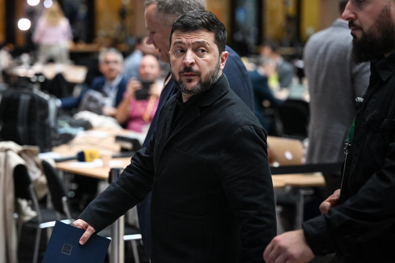 Ukraine's President Volodymyr Zelenskyy leaves after addressing a press conference as part of a European Union summit at the EU headquarters in Brussels on October 16, 2026. (AFP Photo)