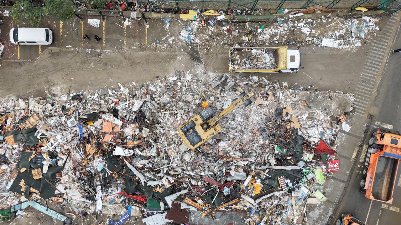 Heavy machinery clears debris following the demolition of structures located in a streambed in the Ayazaga neighborhood of the Sariyer district, which was hit by recent flooding, in Istanbul, Türkiye on October 18, 2026. (AA Photo)