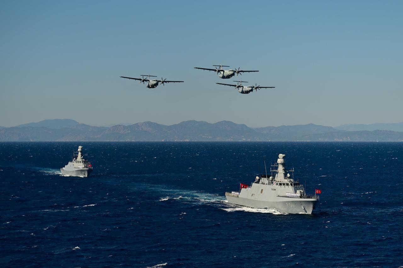 Naval vessels and aircraft participate in a ceremonial parade during the Denizkurdu-I/2026 Exercise in the Eastern Mediterranean, off the coast of Aksaz, Marmaris in Mugla, Türkiye, Sept. 24, 2026. (AA Photo)