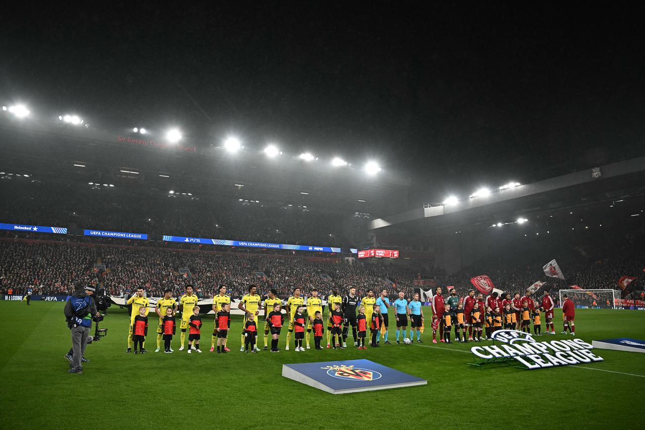 Players line up ahead of the UEFA Champions League football match between Liverpool and Villareal at Anfield in Liverpool, north west England on October 20, 2026. (AFP Photo)