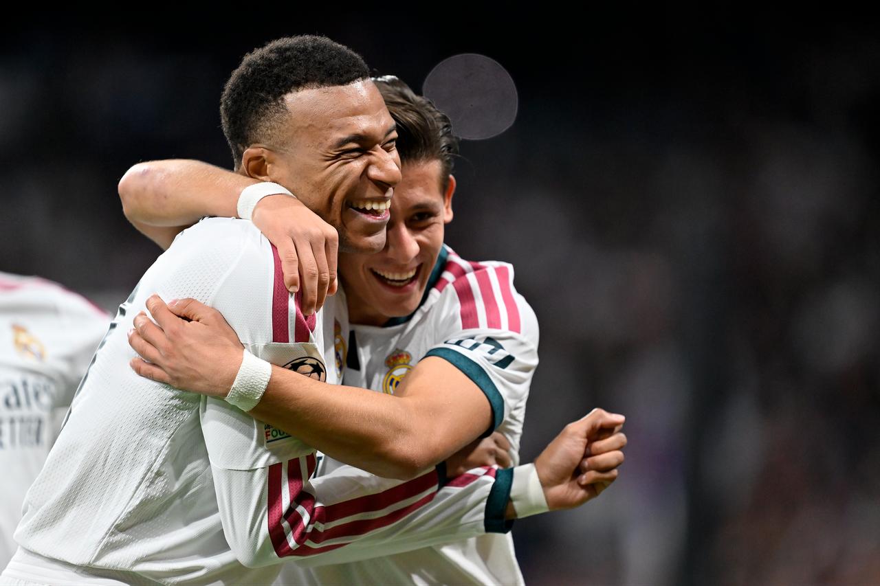 Arda Guler of Real Madrid celebrates with his teammates after a goal during the UEFA Champions League match between Real Madrid and RB Leipzig at the Santiago Bernabeu Stadium in Madrid, Spain on October 21, 2026. (AA Photo)
