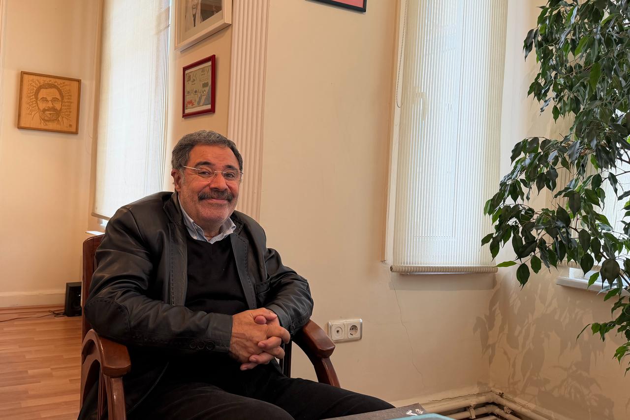 Turkish crime novelist Ahmet Umit poses for a photograph at his office in Istanbul, Türkiye, Oct. 19, 2026. (Photo by Türkiye Today team)