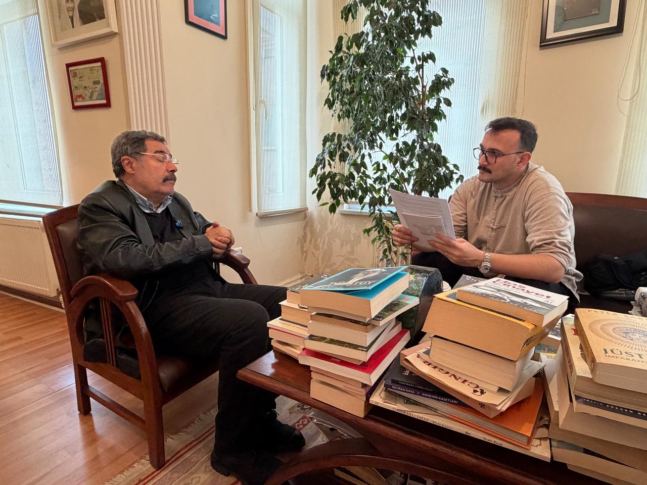 Acclaimed Turkish crime novelist Ahmet Umit (L) speaks with Koray Erdogan, Türkiye Today's Chief Arts and Culture Editor, during an exclusive interview in Istanbul, Türkiye, Oct. 19, 2026. (Photo by Türkiye Today team)