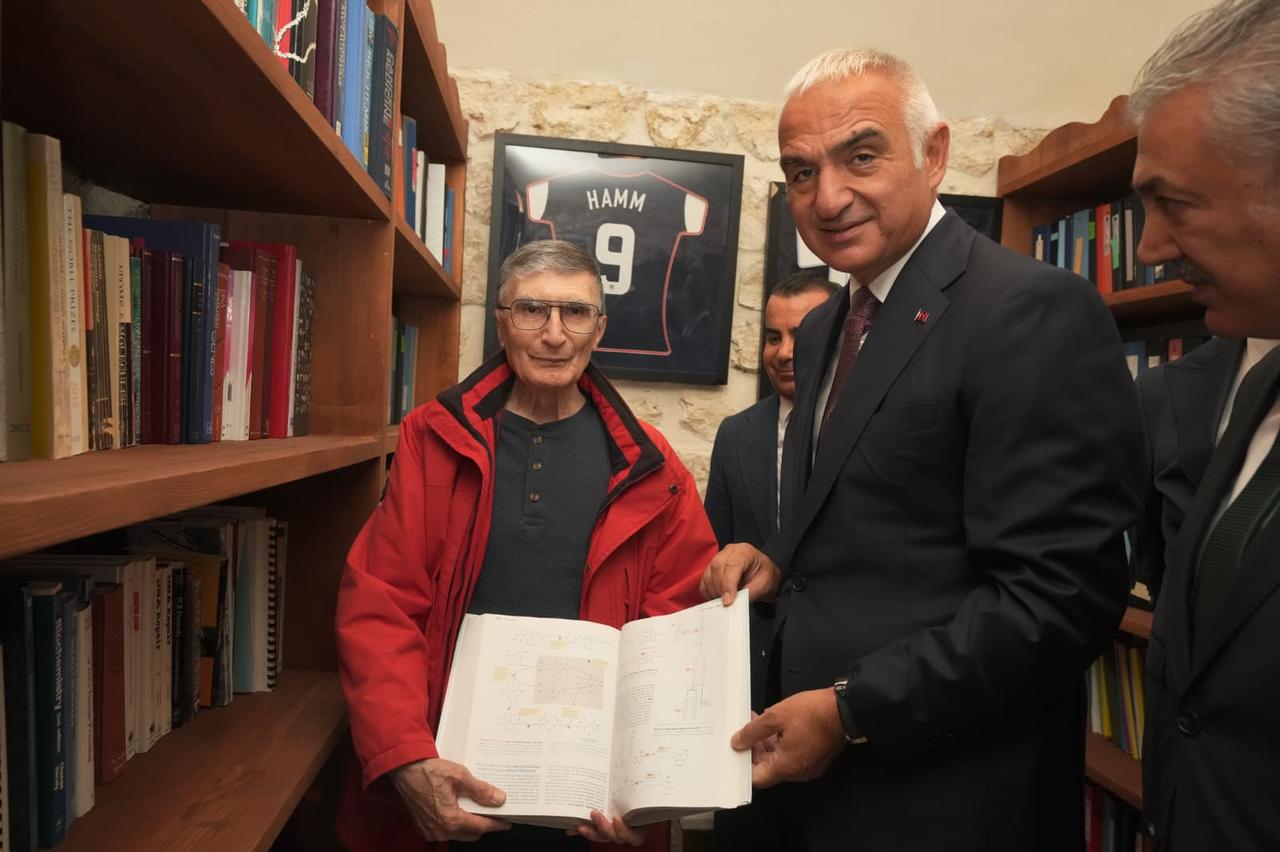 Nobel laureate Aziz Sancar and Culture and Tourism Minister Mehmet Nuri Ersoy examine a scientific publication during their visit to the Aziz Sancar Museum in Savur, Mardin, Türkiye, October 21, 2026. (AA Photo)