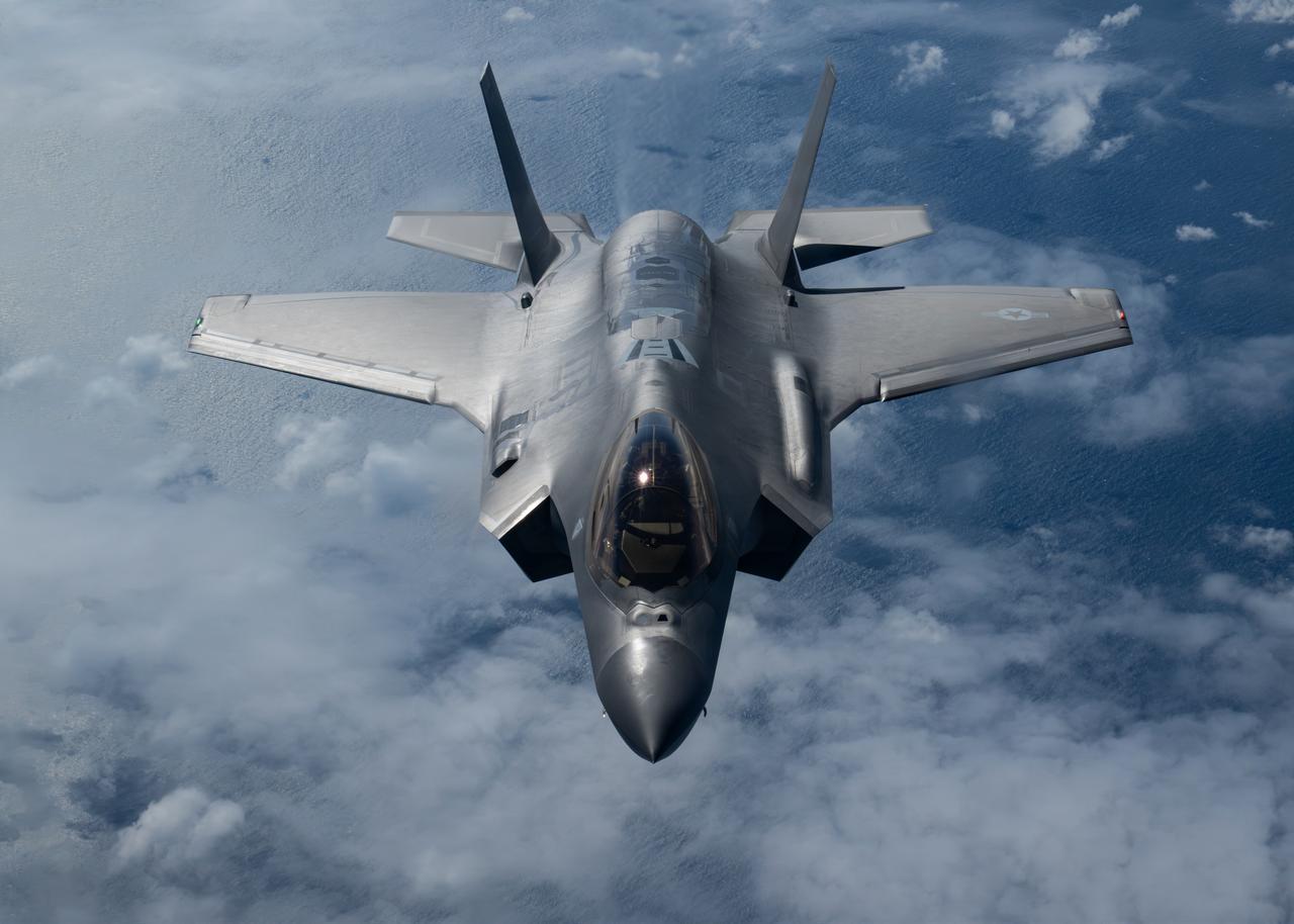 A U.S. Air Force F-35 Lightning II flies into formation with a KC-135 Stratotanker assigned to the 100th Air Refueling Wing over the Atlantic Ocean, Oct. 7, 2026. (Photo via U.S. Air Force)