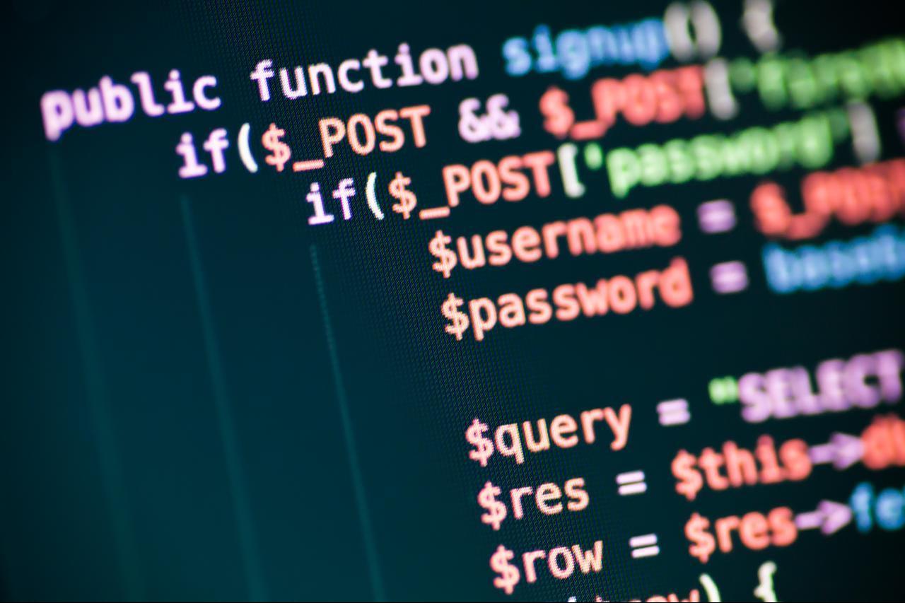 A close-up of PHP code displayed on a computer screen. (Adobe Stock Photo)