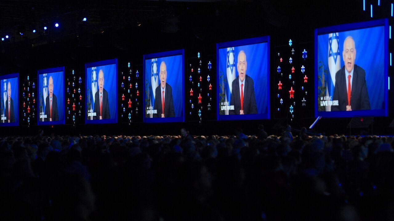 Prime Minister of Israel Benjamin Netanyahu speaks on screen from Israel, during the AIPAC annual meeting in Washington, DC, on March 26, 2019. (AFP Photo)