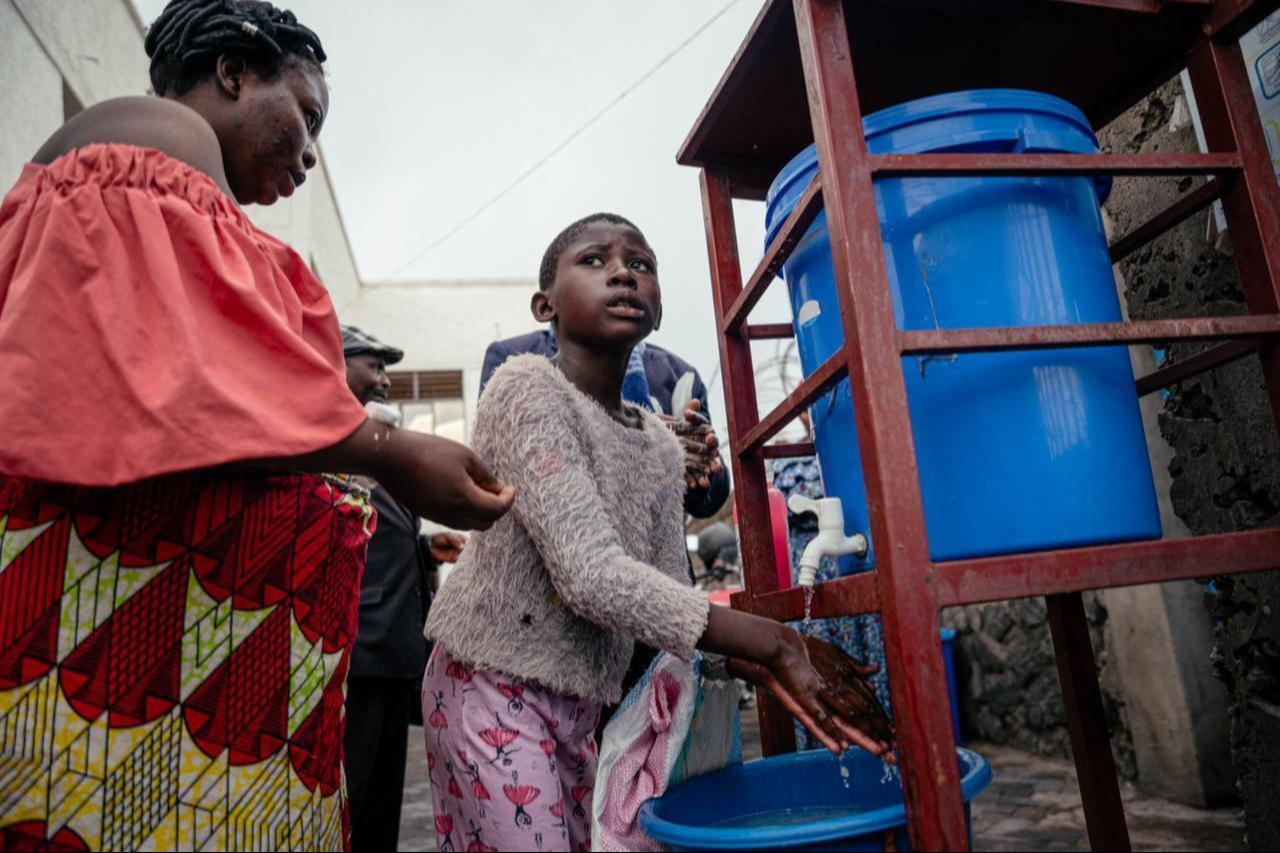 A visitor at the CBCA Virunga hospital washes his hands before leaving the hospital as part of Ebola prevention measures in Goma, May 21, 2026. (AFP Photo)