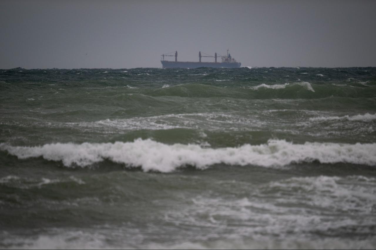 A cargo ship is pictured in the Black Sea in Krapets, on October 14, 2026, a day after suspected Russian drones struck two cargo ships off Bulgaria. (AFP Photo)
