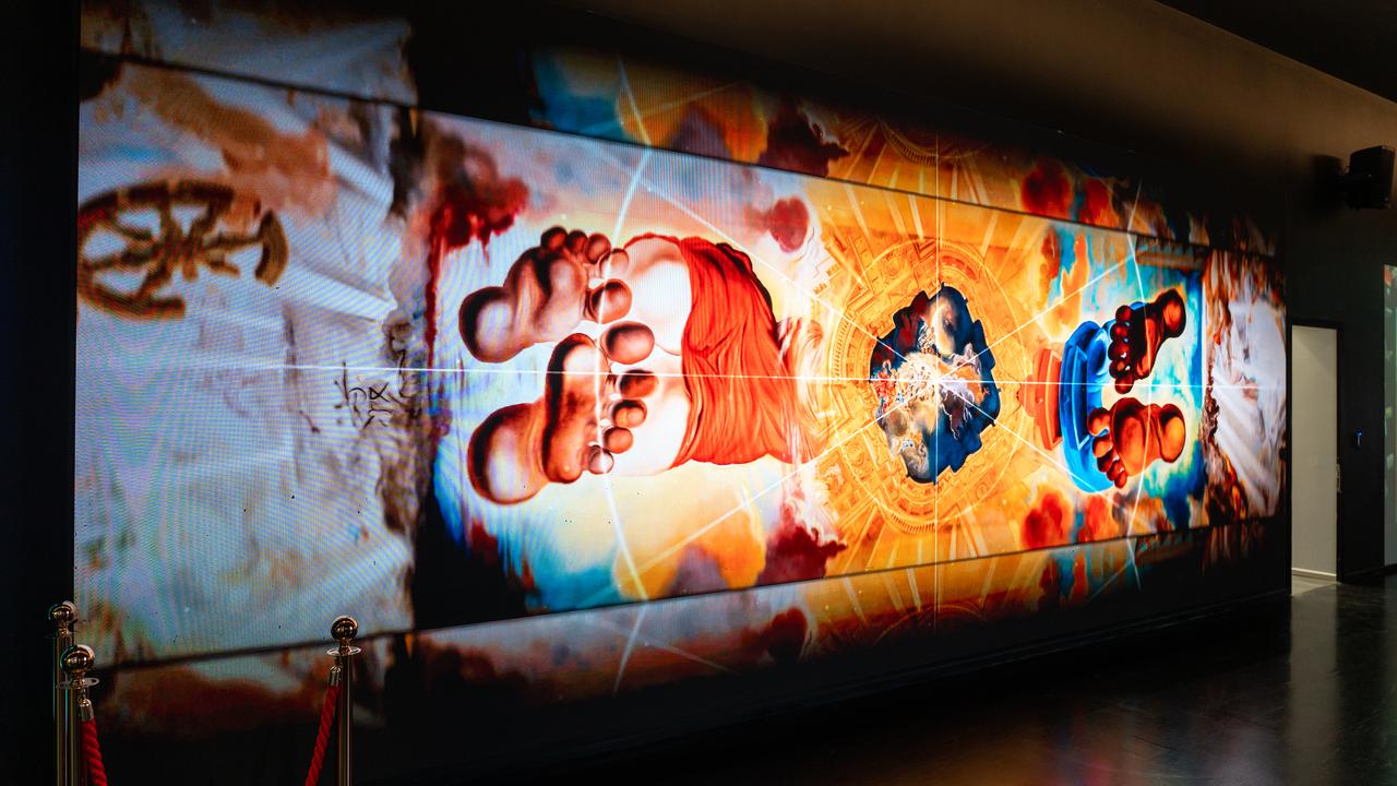 A digital installation featuring surrealist imagery inspired by Salvador Dali's artworks is displayed at the "Salvador Dali's World" exhibition in Istanbul, Türkiye, Oct. 22, 2026. (AA Photo)