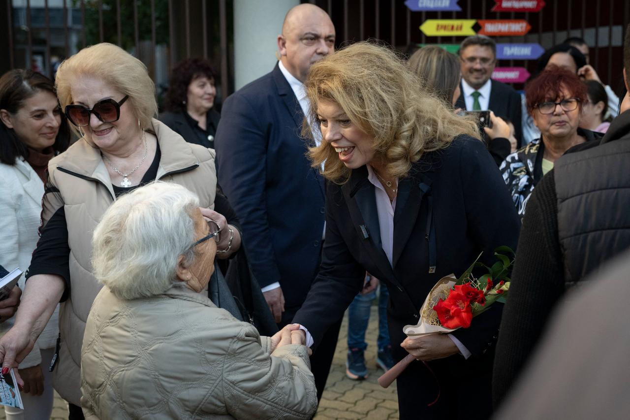 Incumbent President and Presidential candidate Iliana Iotova (CR) meets supporters during a pre-election rally in Dimitrovgrad, South Bulgaria, on October 21, 2026, prior the Presidential elections in Bulgaria on October 25. (AFP Photo)