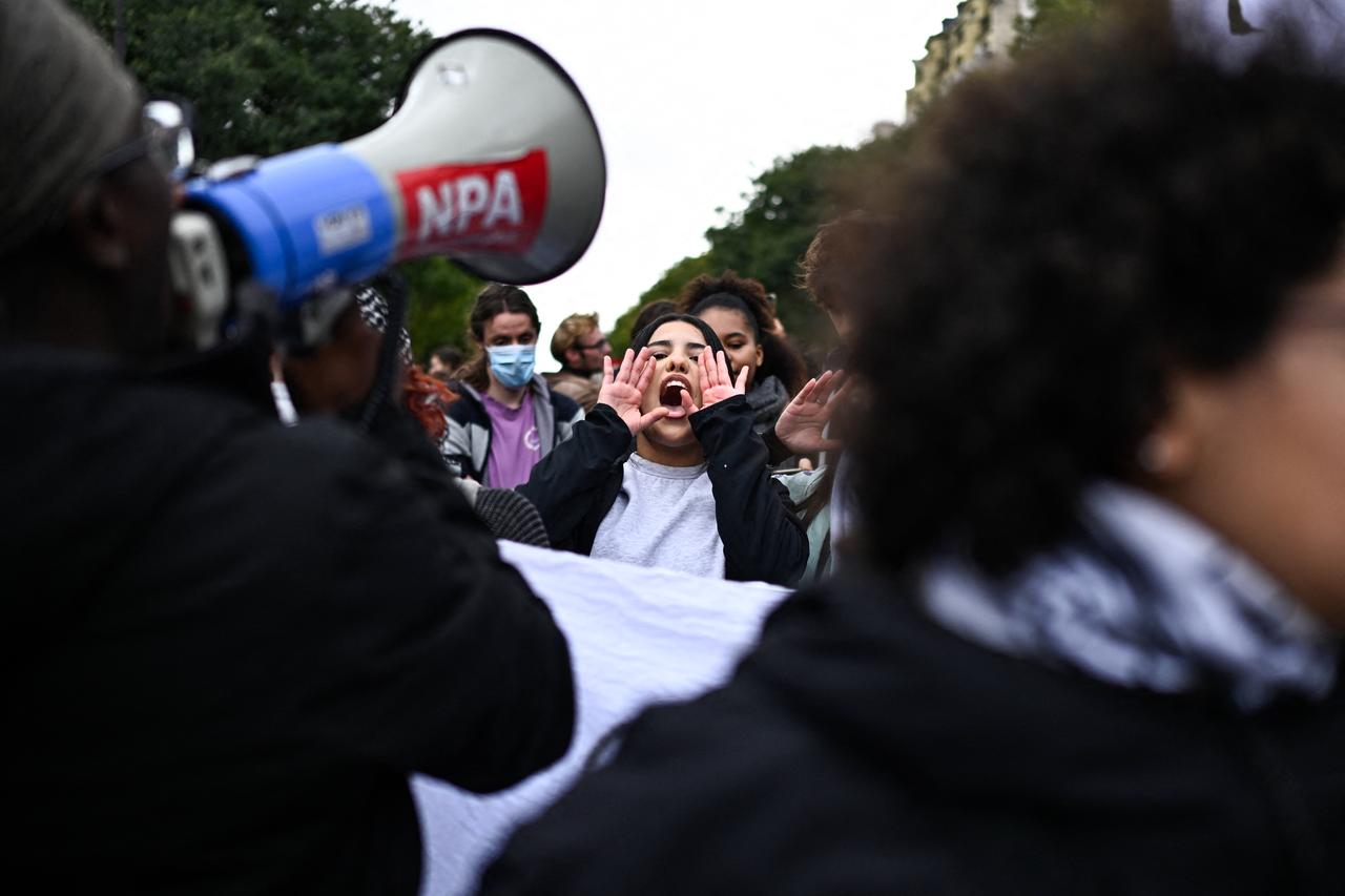 A protester shouts slogans during a demonstration over learning conditions in Paris on October 22, 2026, as France braced for more demonstrations just days after student and other rallies degenerated into some of the worst street unrest in years. (AFP Photo)