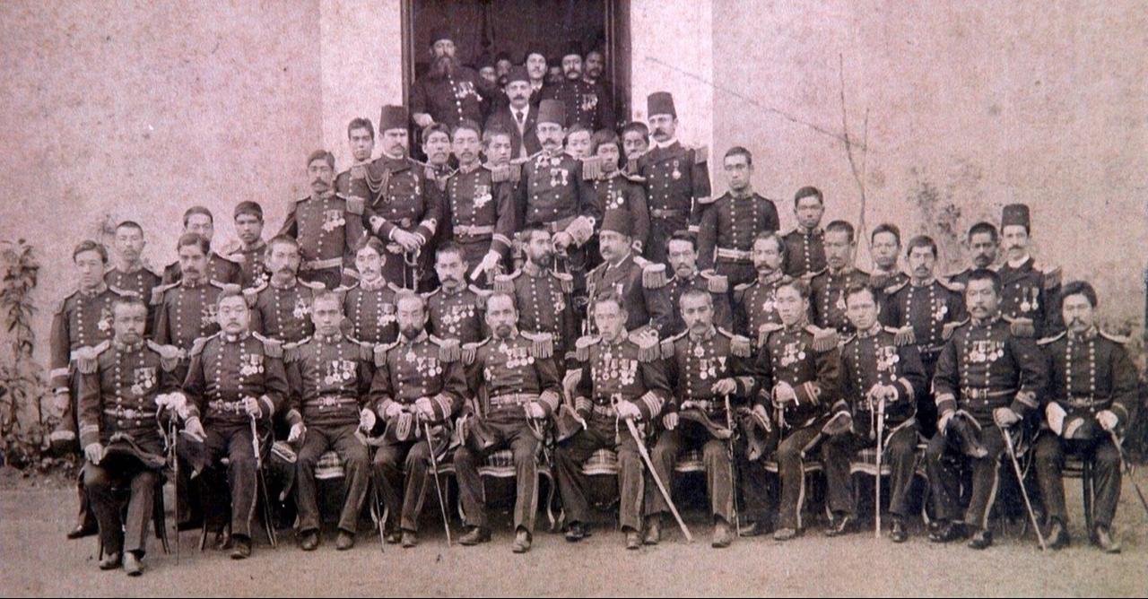 Members of the Ottoman delegation aboard the Ertugrul frigate pose alongside Japanese military personnel during their historic visit to Japan in 1890. (Photo via Wikimedia)