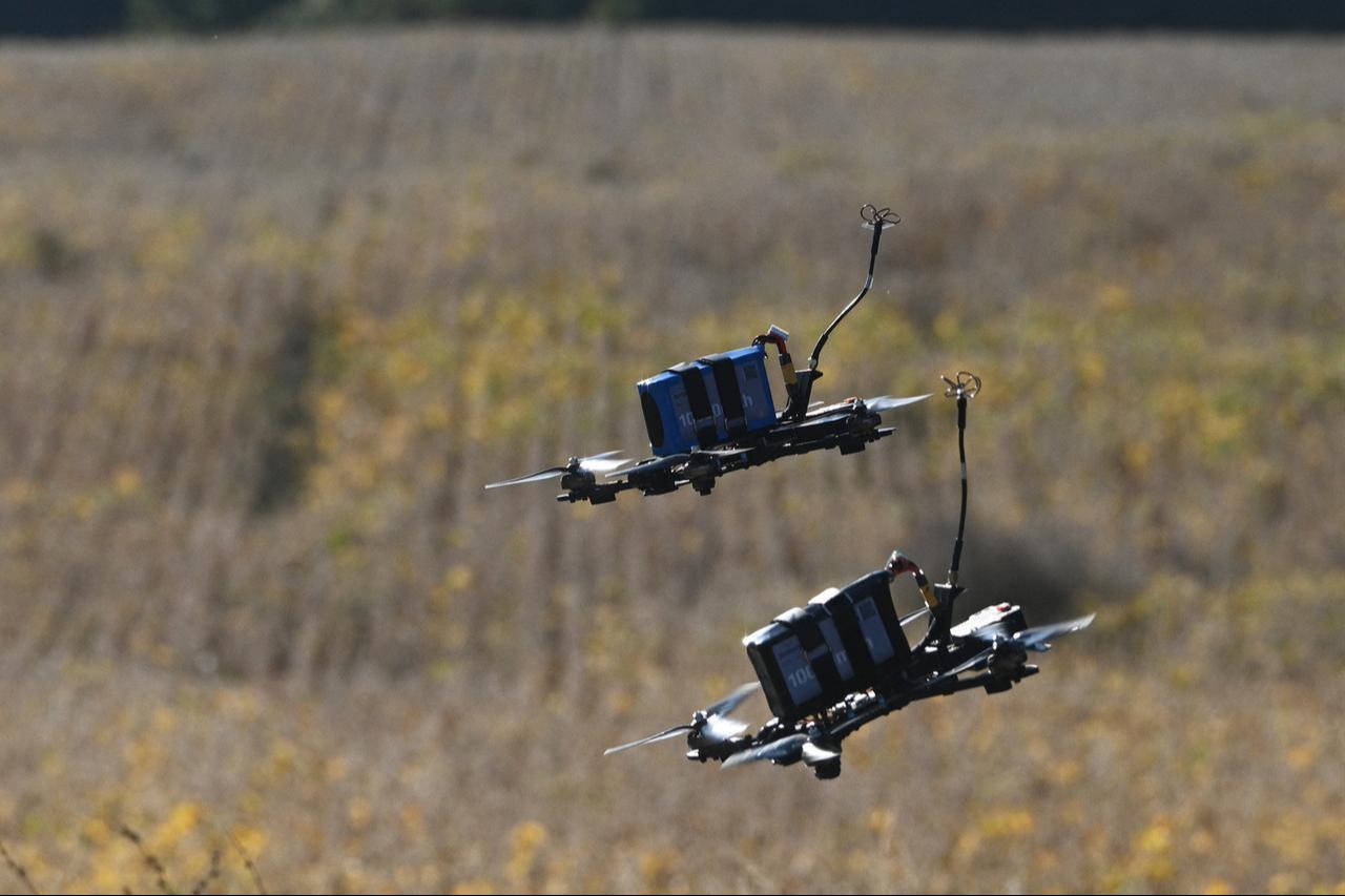 Drones fly over a field during the "Wild Drones" racing competition, designed to simulate battlefield conditions, at an undisclosed location in the Chernivtsi region on Sept. 30, 2026. (AFP Photo)
