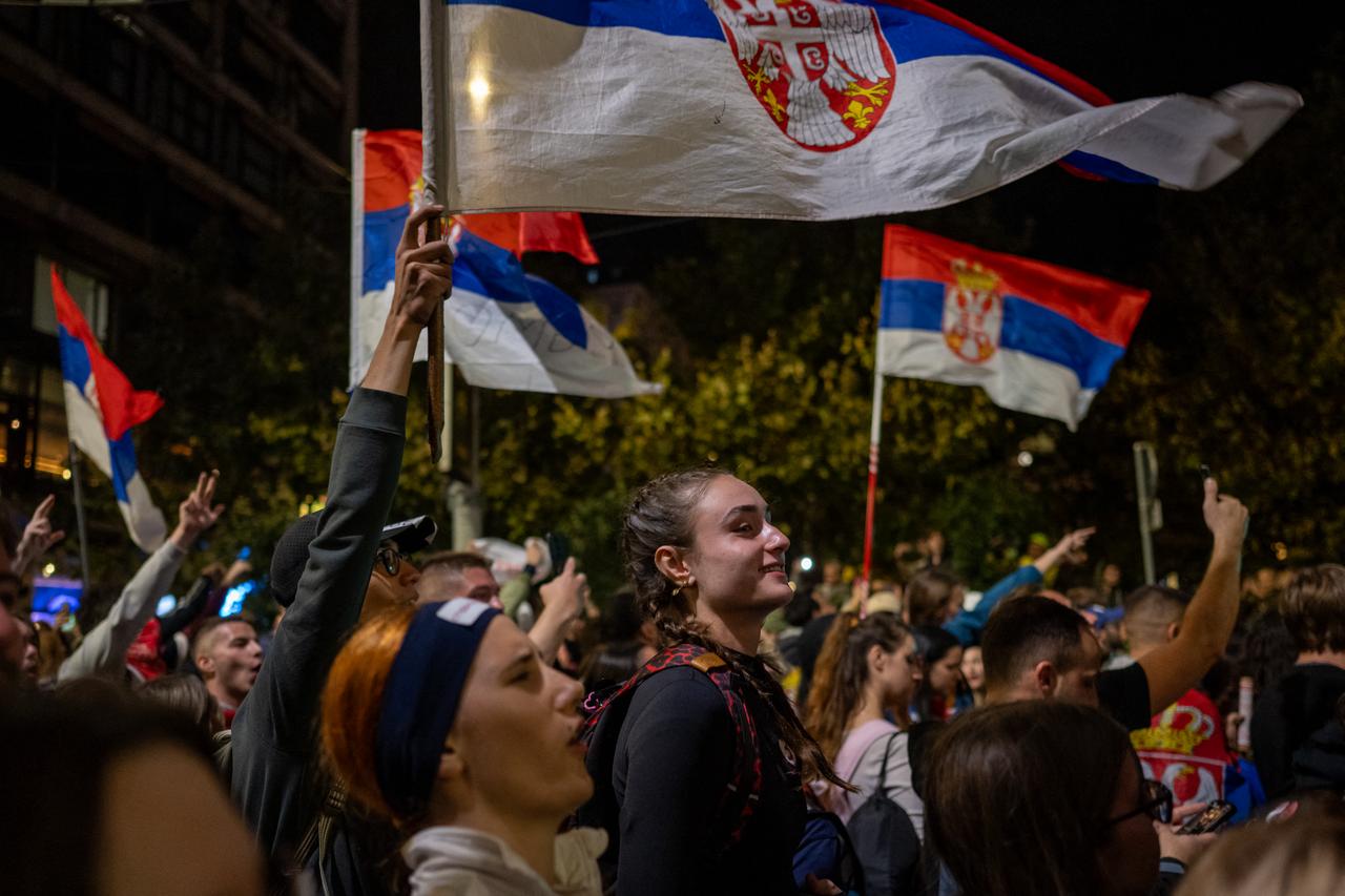 Students cheer and celebrate as they arrive in central Belgrade on October 21, 2026, after walking for several days to attend the student movement's final major rally, due to be held in the capital the following day, ahead of Serbia's October 25 snap elections. (AFP Photo)