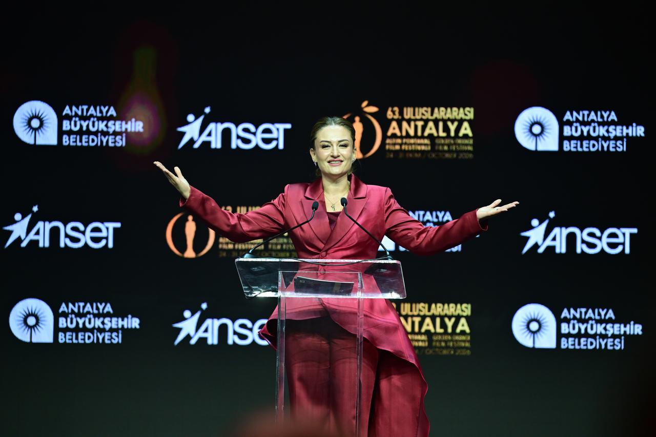 Antalya Metropolitan Municipality Deputy Mayor Busra Ozdemir delivers an opening address during the opening ceremony of the 63rd International Antalya Golden Orange Film Festival at the Antalya Sports Hall. (AA Photo)