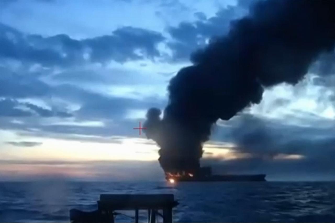 This video grab, taken from images released by the Security Service of Ukraine (SBU) on November 29, 2025, shows smoke rising from a cargo ship on fire in the Black Sea off the Turkish coast. (AFP Photo/Security Service of Ukraine/Handout)