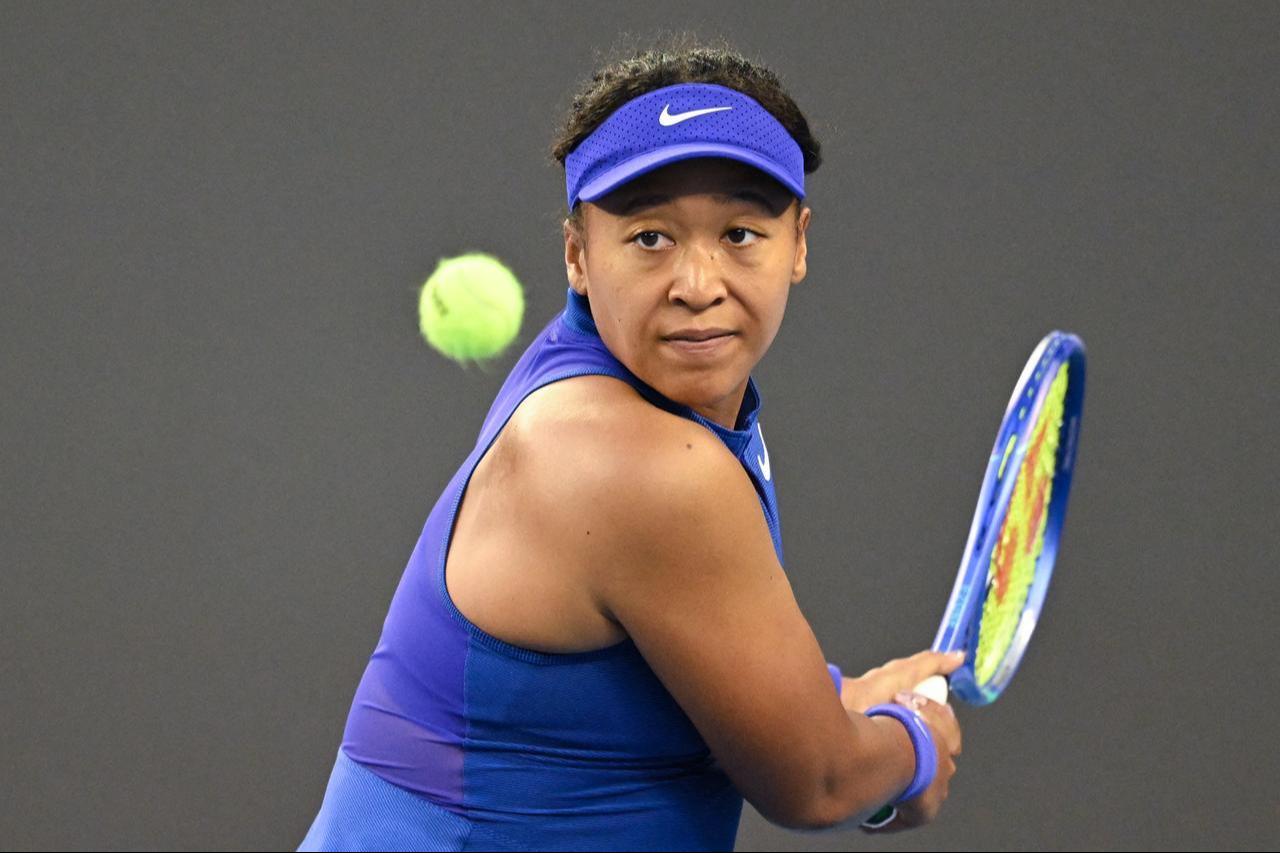 Japan's Naomi Osaka hits a return to Czech Republic's Karolina Muchova during their women's singles match at the China Open tennis tournament in Beijing on Oct. 6, 2026. (AFP Photo)
